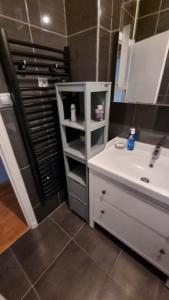 Koupelna v ubytování Appartement dans résidence calme