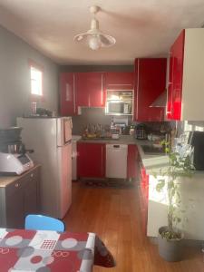 Kuchyň nebo kuchyňský kout v ubytování Appartement dans résidence calme