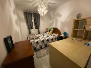 Postel nebo postele na pokoji v ubytování Appartement dans résidence calme