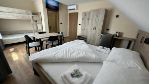 Postel nebo postele na pokoji v ubytování Ubytování U Pupka + 33 fotografií
