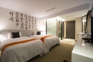 ภาพในคลังภาพของ Travel Art Inn ในนครเจียอี้