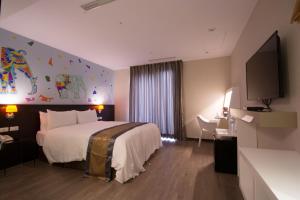 ภาพในคลังภาพของ Travel Art Inn ในนครเจียอี้