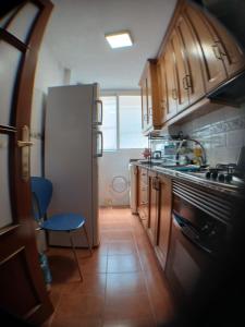 Køkken eller tekøkken på Comfort Apartamento Compartido