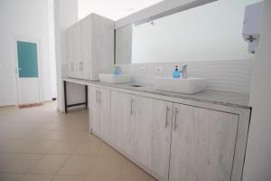 Kuchyň nebo kuchyňský kout v ubytování Hostel K13