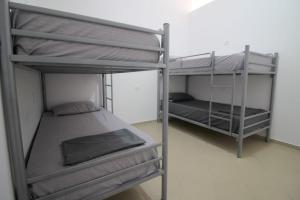 Postel nebo postele na pokoji v ubytování Hostel K13