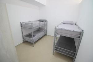 Postel nebo postele na pokoji v ubytování Hostel K13