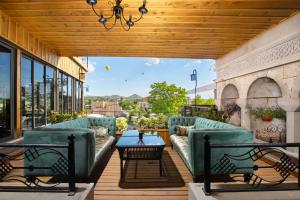 A seating area at Cappadocia Pegasos Cave Suite Hotel