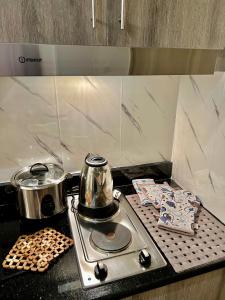 Dapur atau dapur kecil di A fancy Staycation by DMR