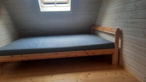 Postel nebo postele na pokoji v ubytování Domek nad morzem Jerzyk 506-385-791