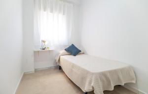 En eller flere senge i et værelse på Apartamento En Almería + 12 billeder