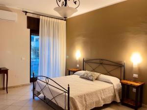 Postel nebo postele na pokoji v ubytování B&B Tempa Rossa