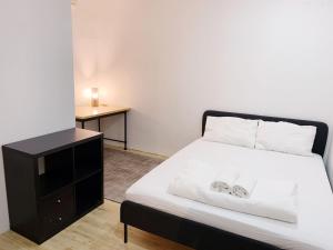 Postel nebo postele na pokoji v ubytování RadZone Hostel