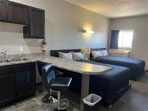 Posezení v ubytování Come on Inn Motel