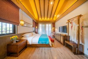 TV a/nebo společenská místnost v ubytování Blossom Hill Yuejingzhuang Hotel