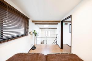 Voodi või voodid majutusasutuse アンティークス岐阜駅東 toas
