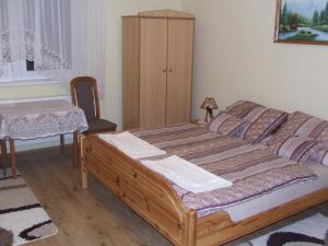 Postel nebo postele na pokoji v ubytování Meggyes Vendégház