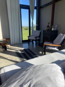 Χώρος καθιστικού στο Ita Pora Lodge