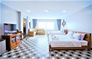 TV a/nebo společenská místnost v ubytování CALAO Kep Residence Hotel