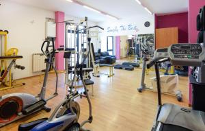 a gym with several treadmills and exercise bikes at Lovely Apartment In Tuoro Sul Trasimeno in Tuoro sul Trasimeno
