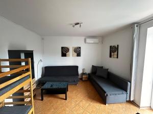 Apartamenty i Pokoje Tornado的休息区