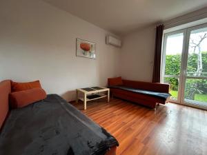 Apartamenty i Pokoje Tornado的休息区