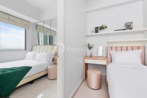 Ein Bett oder Betten in einem Zimmer der Unterkunft Mukava by Kozystay - Grogol