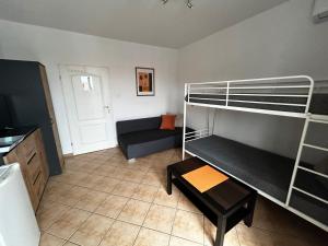 Apartamenty i Pokoje Tornado客房内的一张或多张床位