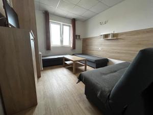 Apartamenty i Pokoje Tornado的休息区