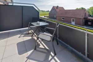 Balkón nebo terasa v ubytování Ferienhaus Empora
