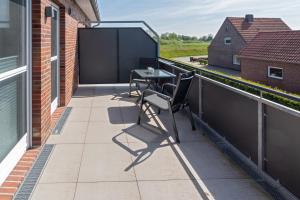 Balkón nebo terasa v ubytování Ferienhaus Empora
