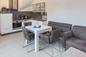 Kuchyň nebo kuchyňský kout v ubytování Ferienwohnung Seestern