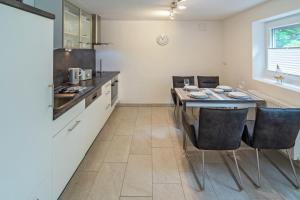 Kuchyň nebo kuchyňský kout v ubytování Ferienwohnung Strandläufer