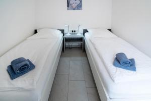 Postel nebo postele na pokoji v ubytování Ferienwohnung Strandläufer