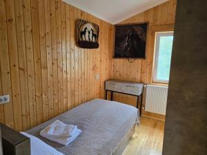 Postel nebo postele na pokoji v ubytování Dariani Cottage
