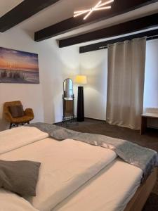 Postel nebo postele na pokoji v ubytování Hotel Biedermeier + 23 fotografií