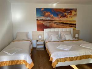 Posteľ alebo postele v izbe v ubytovaní Stilo Hotel