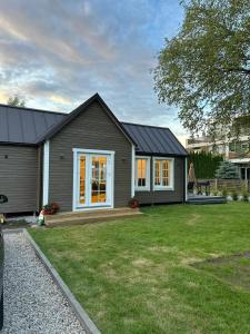a small house with a large yard at Melluži tiny house 60m2 in Jūrmala