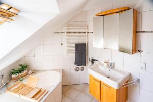 Koupelna v ubytování Ferienwohnung Am Laufer Bach + 23 fotografií