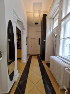 Postel nebo postele na pokoji v ubytování Phoenix Apartment