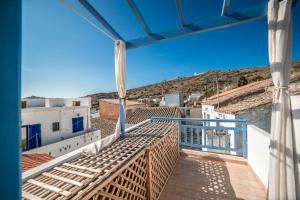 a view from the balcony of a house at Κυκλαδίτικη Μεζονέτα in Kithnos