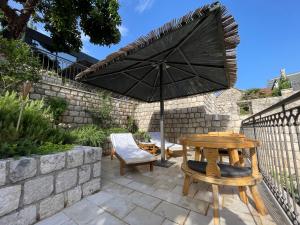 Patio nebo venkovní prostory v ubytování Vila Djuro Mikijelj