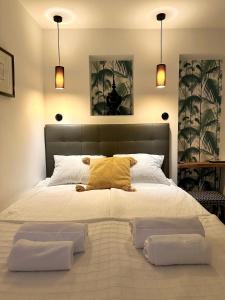 A bed or beds in a room at Palm House 10 Még 32 kép