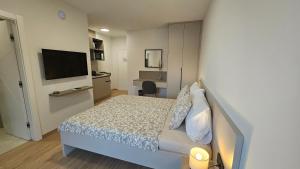 TV a/nebo společenská místnost v ubytování Richi Rooms & App