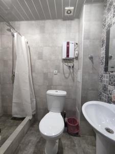 Koupelna v ubytování Hotel Talin