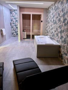 Voodi või voodid majutusasutuse Hotel Saccardi & Spa - Adults Only toas