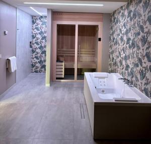 Voodi või voodid majutusasutuse Hotel Saccardi & Spa - Adults Only toas