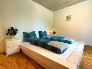 Postel nebo postele na pokoji v ubytování Ferienwohnung Grüner Ausblick