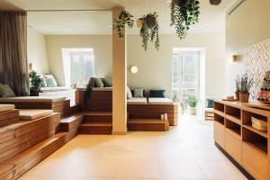 Posteľ alebo postele v izbe v ubytovaní harry's home Lienz hotel & apartments