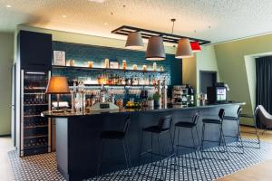 Lounge alebo bar v ubytovaní harry's home Lienz hotel & apartments