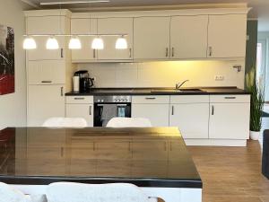 Fotografie z fotogalerie ubytování "Schilfhaus Garten" Unter den Kiefern 61 EG v destinaci Marienfelde